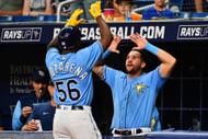 Rays teammates celebrate during a MLB Los Angeles Angels v Tampa Bay Rays game.